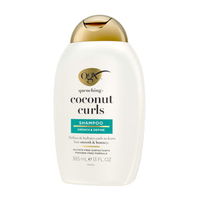 OGX Coconut Curls Shampoo on a wooden surface