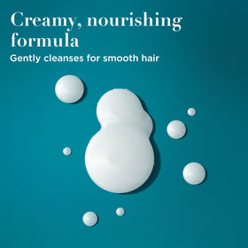 OGX Coconut Milk Shampoo in bathroom setting