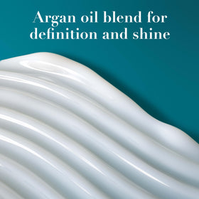 OGX Moroccan Curling Cream with fresh citrus and flowers