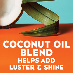 OGX Quenching Coconut Curls Styling Milk on a bathroom shelf