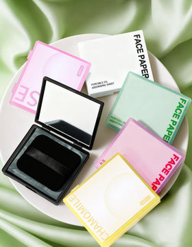 Okerker Oil Blotting Papers being used on a face to absorb oil