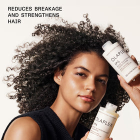 Olaplex N°.4 Bond Maintenance Shampoo 1000 mL side view