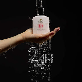 Olay Beauty Fluid Regular 100ml displayed on a vanity