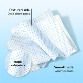 Olay Makeup Remover Wipes with a fresh wipe in hand