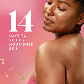 Olay Melon Spritz Body Wash pouring into hand