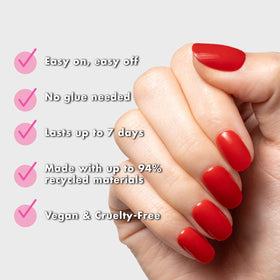 Olive & June Super Stick Press-On Nails Lollipop Cherry Red on model's hands