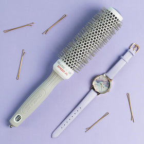 Olivia Garden Hair Brush demonstrating styling technique