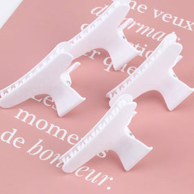 Ondder Hair Clips on a table with hair styling tools