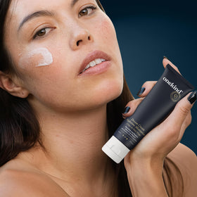 Onekind Night Moisturizer 1.7 oz with a lavender background