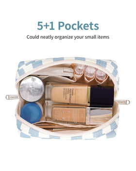 Open view of Narwey makeup bag showing inner pockets