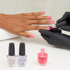 OPI If U Like Pinka Coladas nail lacquer in a beach setting