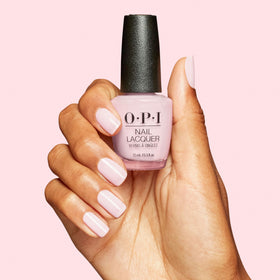 OPI’m a Bubble Bunny nail polish in a beauty setup