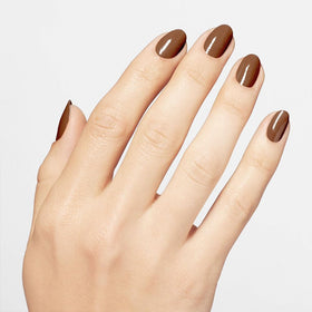 OPI Nail Lacquer Material Gowrl dark brown crème polish applied on nails