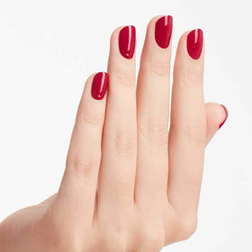 OPI Nail Lacquer Miami Beet purple nail polish brush close-up