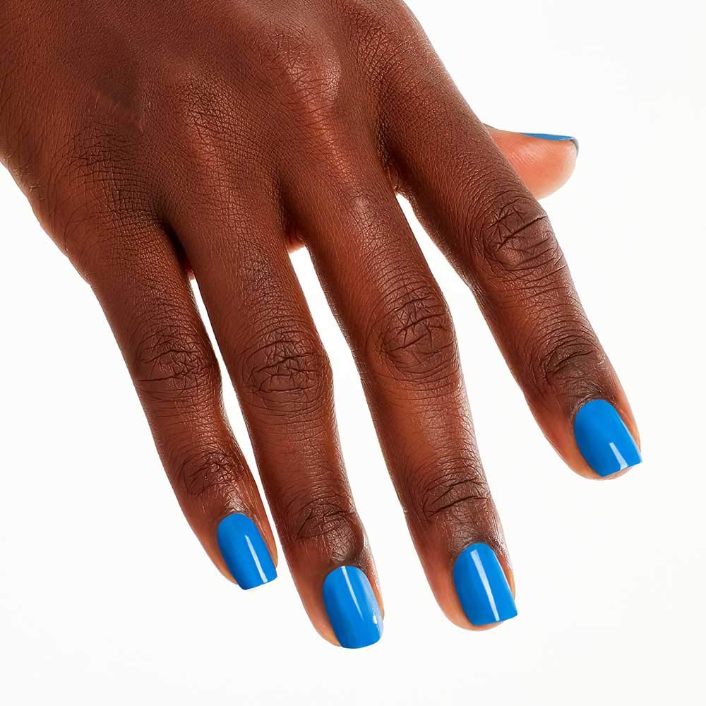 OPI Nail Lacquer Tile Art to Warm Your Heart bright blue polish applied on nails