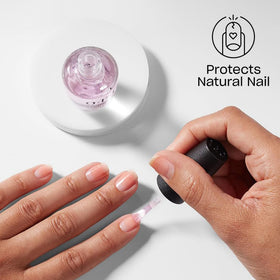 OPI Natural Nail Base Coat on a manicure table