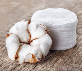 Organyc Organic Cotton Rounds displayed on a bathroom counter