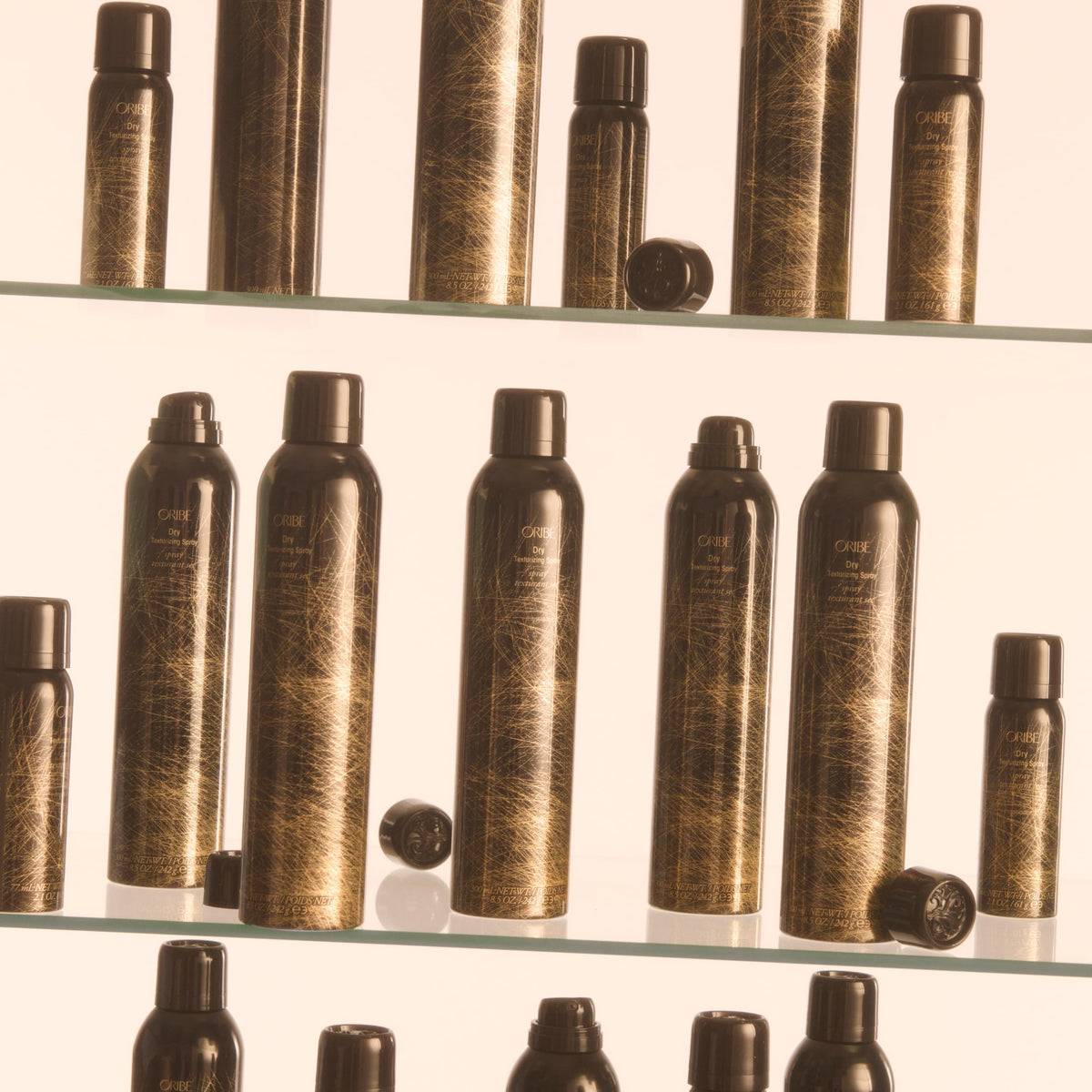 ORIBE Dry Texturizing Spray 2.1oz on a vanity