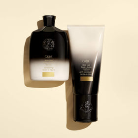 ORIBE Gold Lust Shampoo in a shower setting