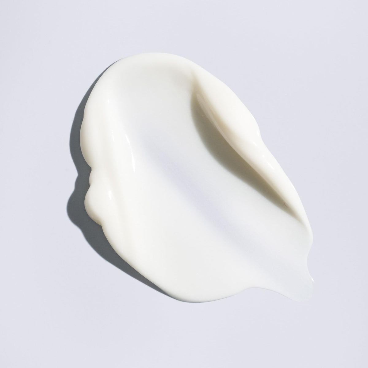 ORIBE Supershine Moisturizing Styling Cream in a bathroom setting