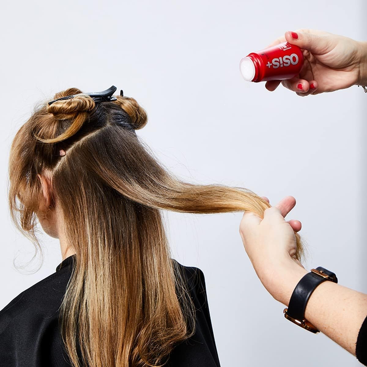 OSiS+ Dust It on a vanity with styling tools