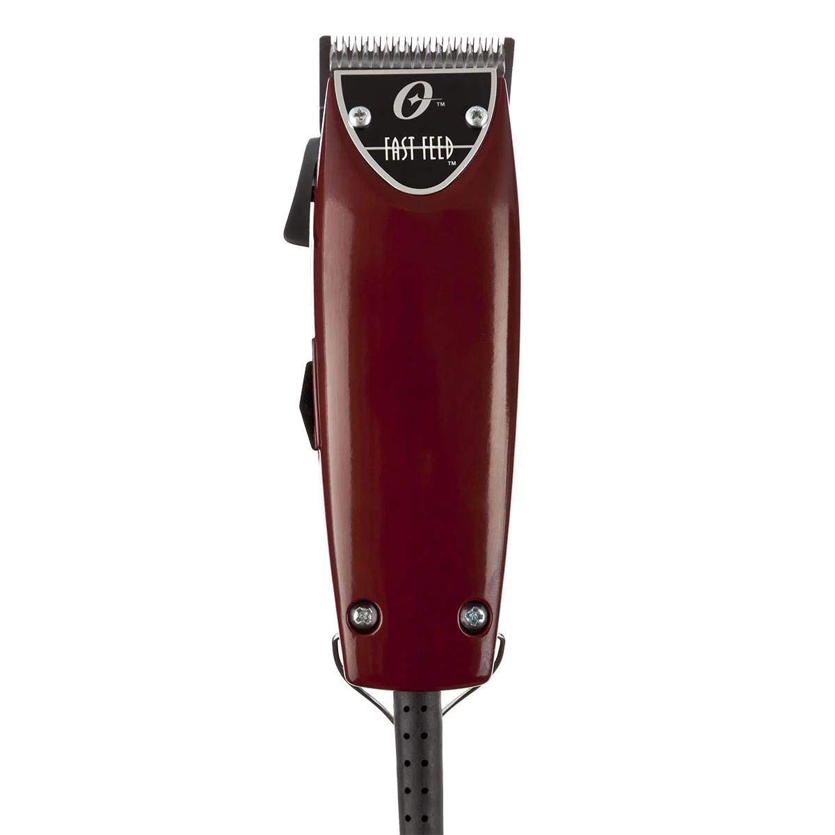 Oster clippers in use on a client's hair