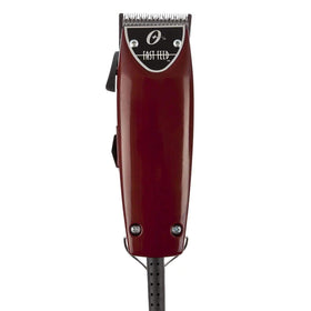 Oster clippers in use on a client's hair