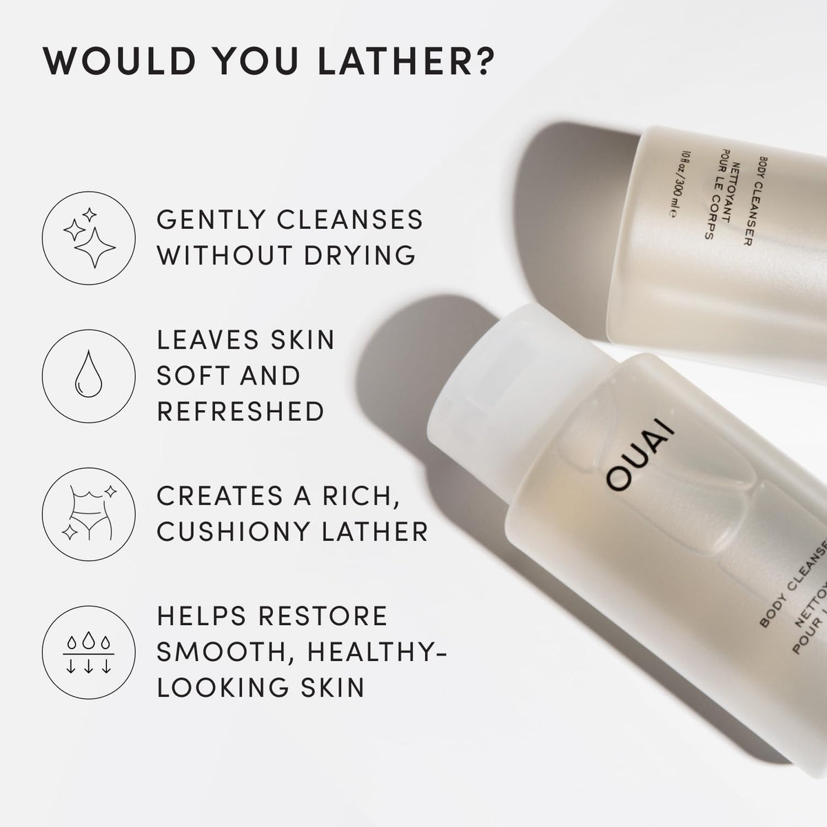 OUAI Body Cleanser foaming lather in a shower setting