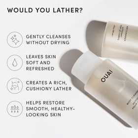 OUAI Body Cleanser foaming lather in a shower setting