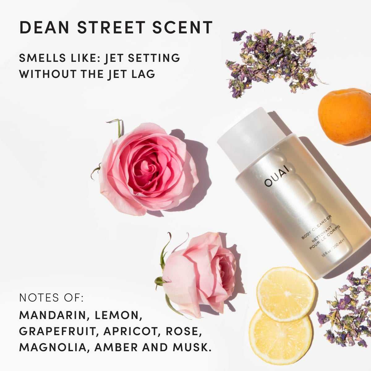 OUAI Body Cleanser in a bathroom setting with towels