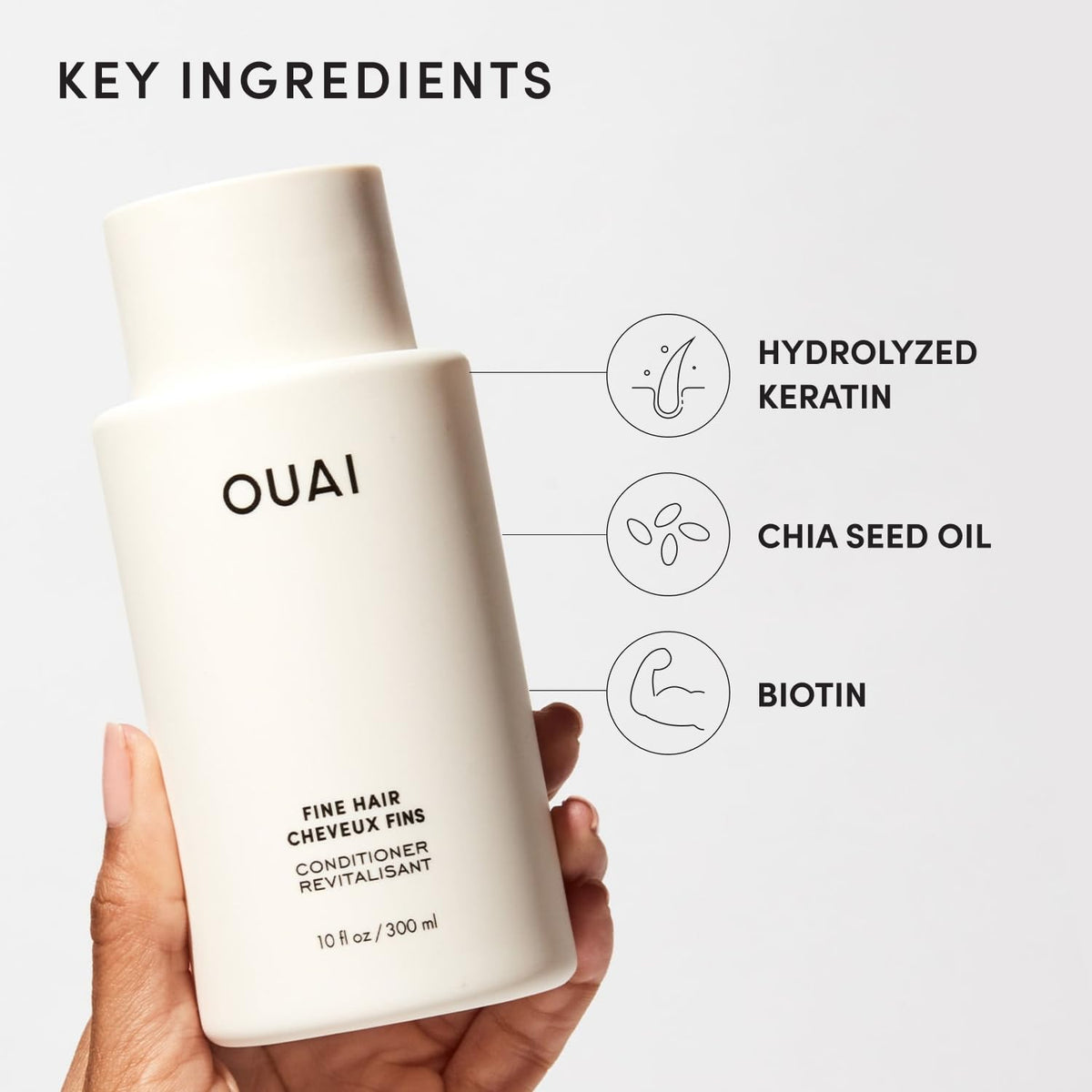 OUAI Fine Hair Conditioner 10 oz on bathroom shelf