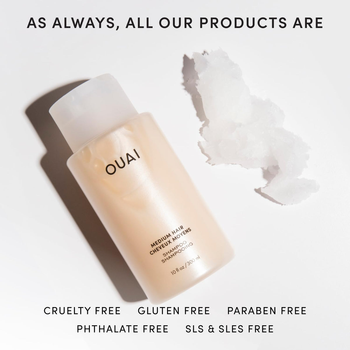 OUAI Medium Hair Shampoo Travel Size 32 Oz on bathroom shelf