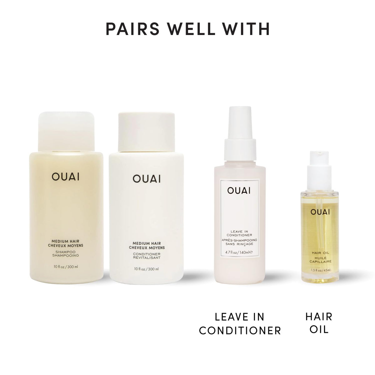 OUAI Medium Shampoo & Conditioner Set on a bathroom shelf