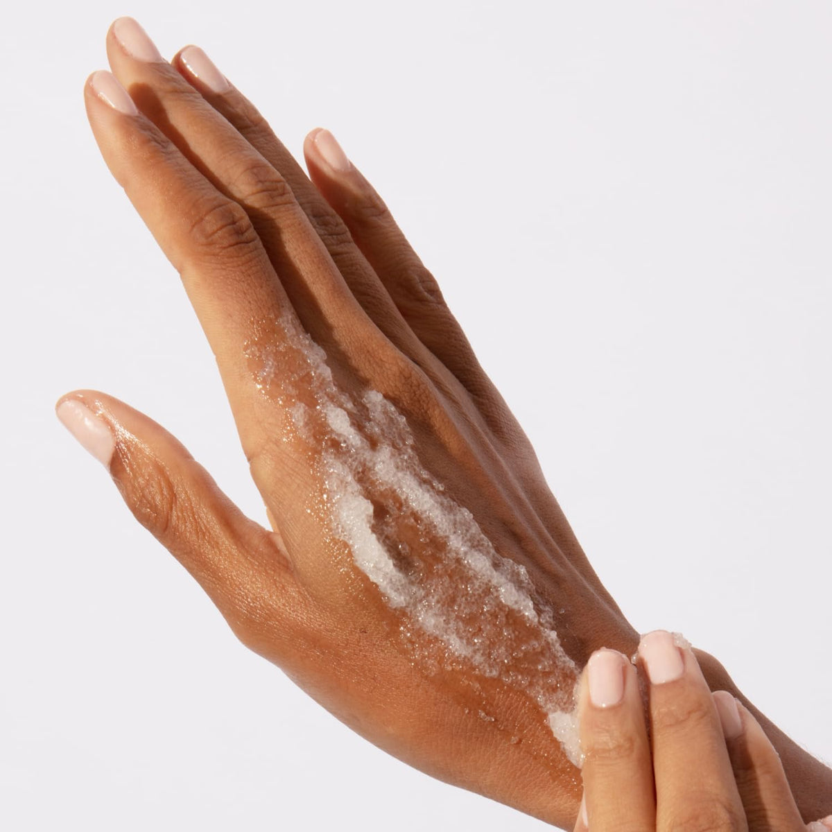 OUAI Scalp & Body Scrub Melrose Place sugar scrub in a bowl