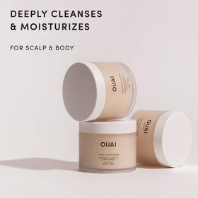 OUAI Scalp & Body Scrub showing texture on hand