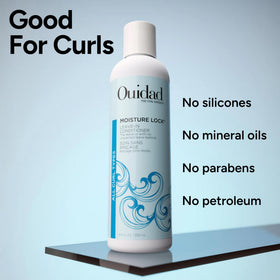 Ouidad Moisture Lock Leave-In Conditioner on a vanity