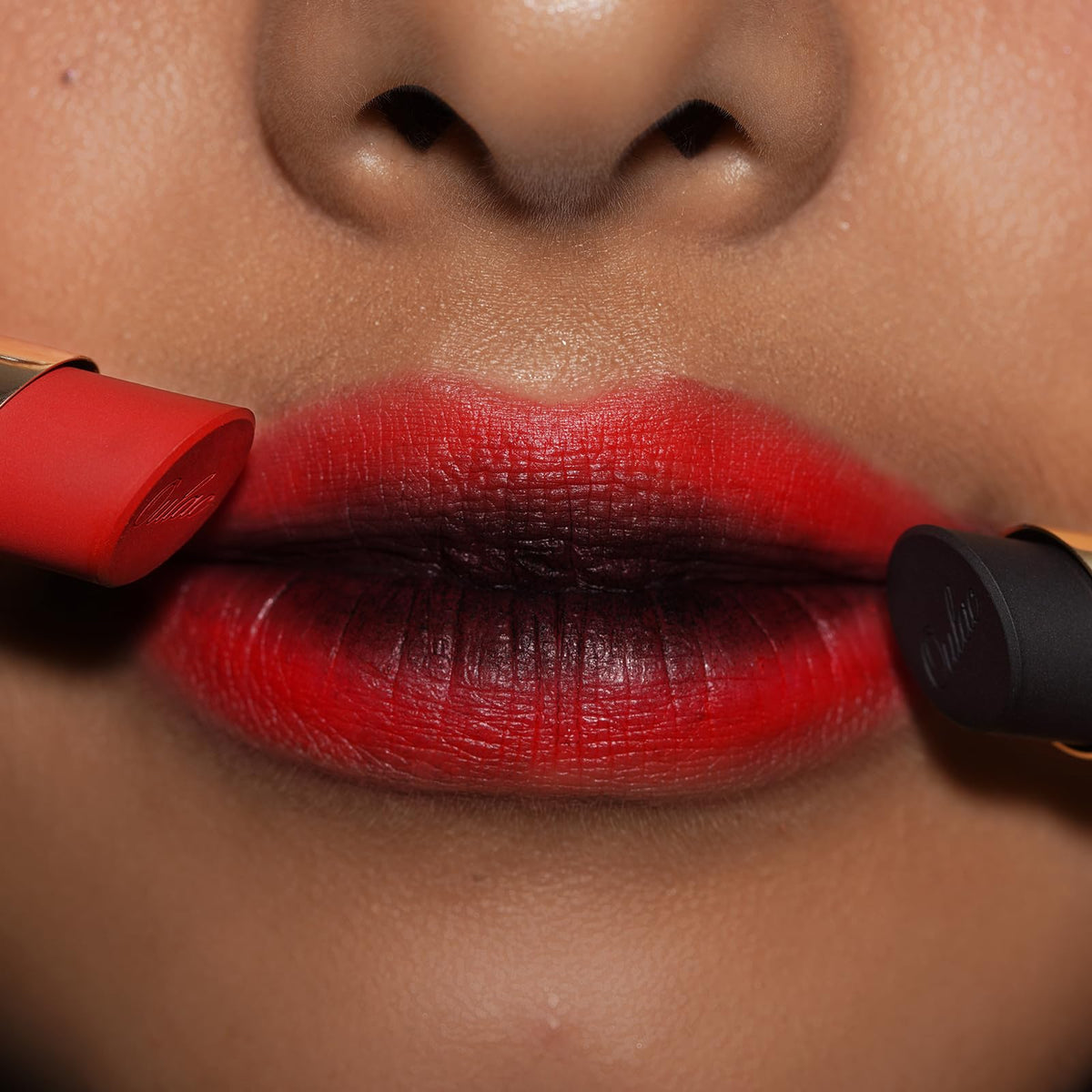 Oulac Deep Red Satin Matte Lipstick applied on model