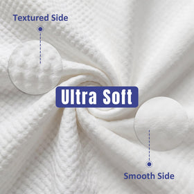 Ourmed Life face towels stacked on a bathroom counter