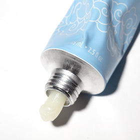 Pacifica Wake Up Beautiful Cleansing Balm in use with damp cloth