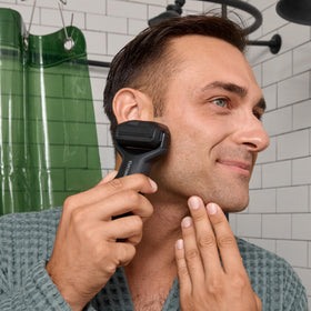 Packaging of MANSCAPED The Chairman™ Plus Men's Electric Foil Face Shaver