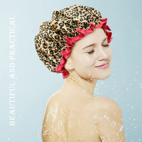 Packaging of TCOTBE shower cap set on a white background