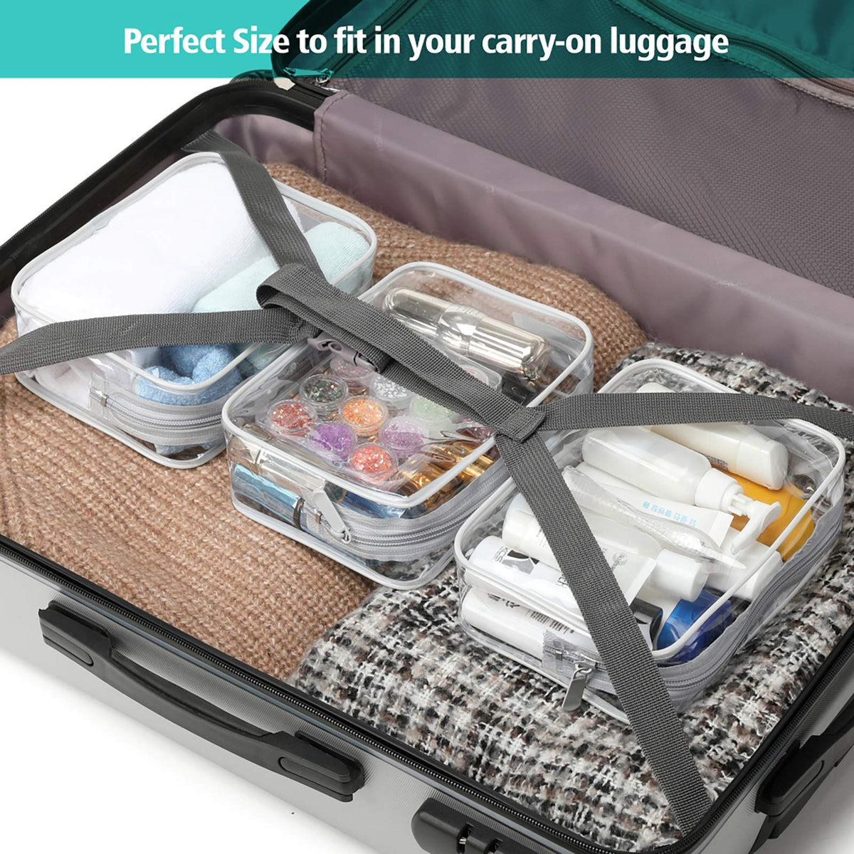 PACKISM Clear Makeup Bag in travel setting with luggage