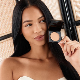 Palladio Under Eye Brightener being applied under eyes