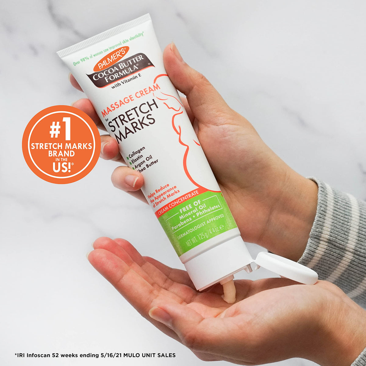 Palmer's Cocoa Butter Massage Cream in lifestyle setting