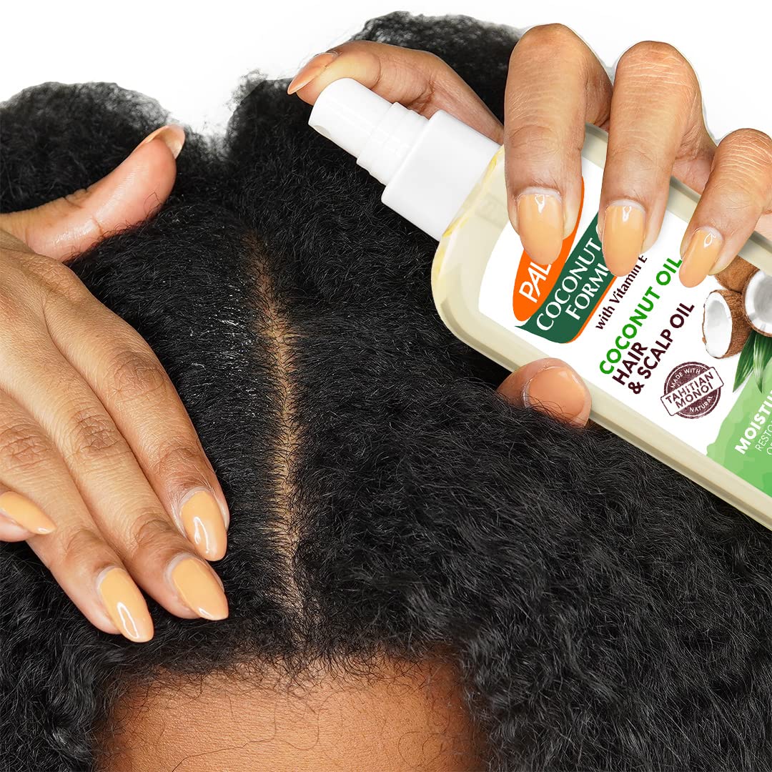 Palmer's Coconut Hair Care Bundle on a wooden table