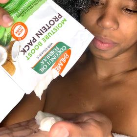 Palmer's Coconut Oil products arranged with coconut pieces