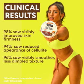 Palmer's Firming Body Cream on a wooden surface with coconut and acai berries
