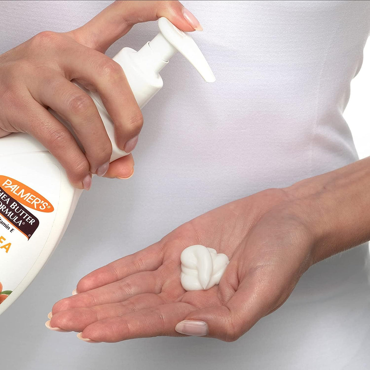 Palmer's Shea Body Lotion being applied to skin