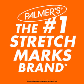 Palmer's Skin Therapy Body Oil bottle on a wooden surface