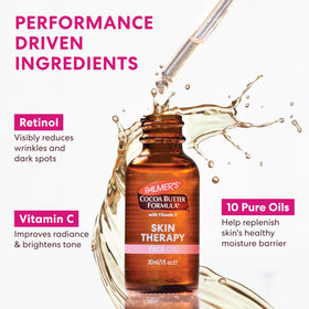 Palmer's Skin Therapy Face Oil Cocoa Butter Formula on a bathroom counter